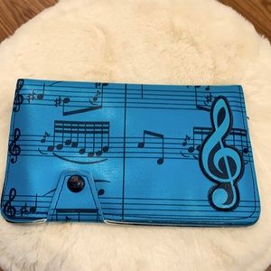 Vintage Paul Frank Turquoise Music Notes wallet with snap closure.